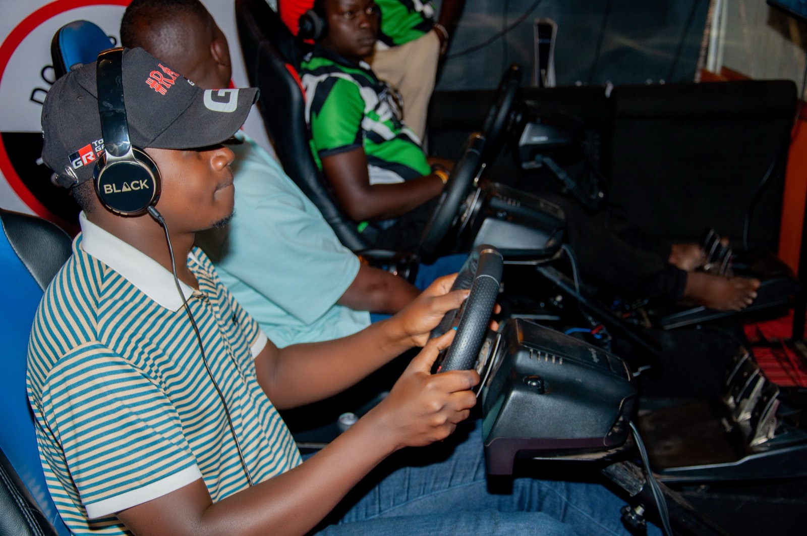 Driver on a sim racing rig, 2025