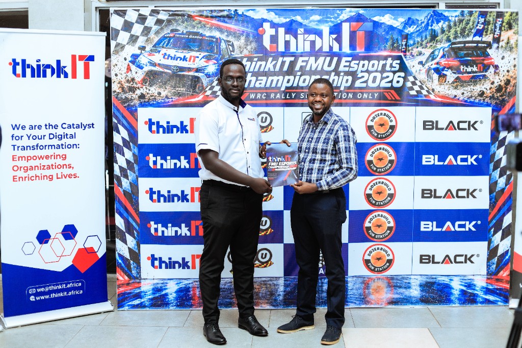 Partners holding the championship booklet